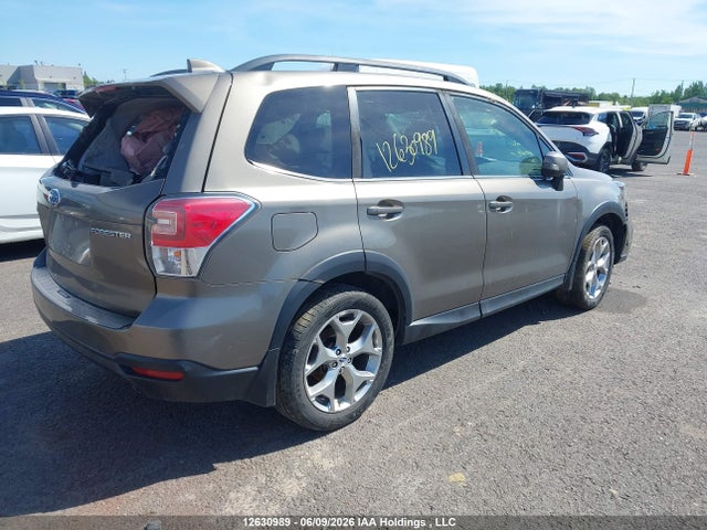 12630989 :رقم المزاد ، JF2SJESC6JH406234 vin ، 2018 Subaru Forester 2.5i Touring مزاد بيع