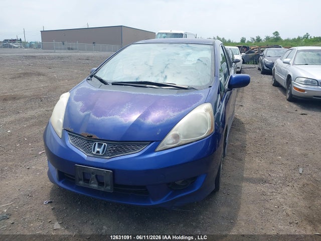 2009 Honda Fit Sport 5dr მანქანა იყიდება აუქციონზე, vin: JHMGE888X9S810955, აუქციონის ნომერი: 12631091