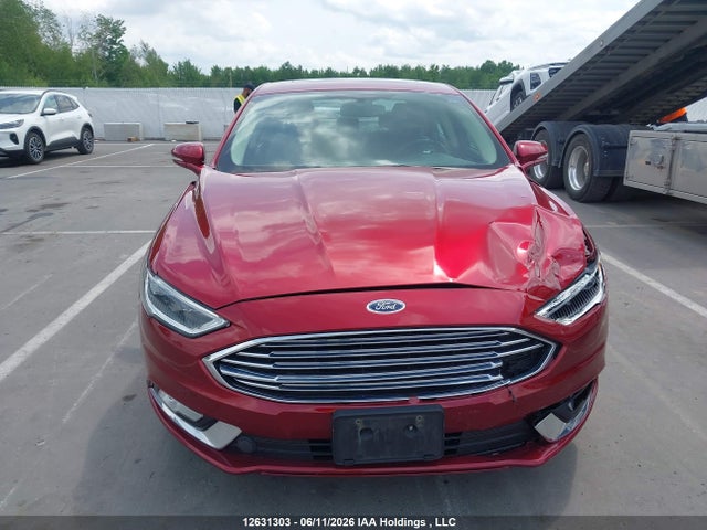 12631303 :رقم المزاد ، 3FA6P0D99HR330994 vin ، 2017 Ford Fusion Titanium مزاد بيع