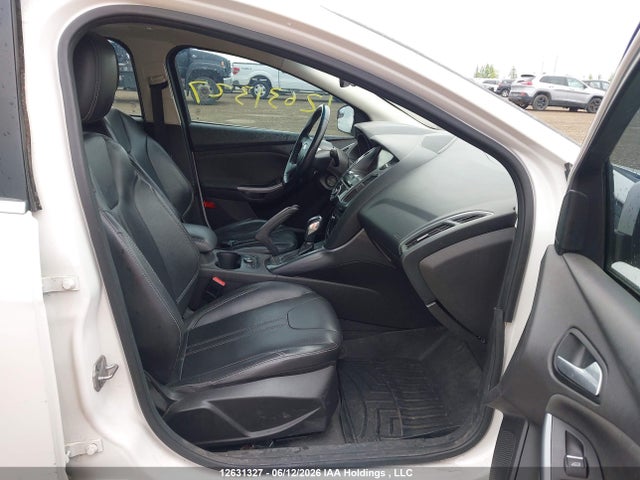 Продажа на аукционе авто 2012 Ford Focus Titanium, vin: 1FAHP3N27CL203387, номер лота: 12631327