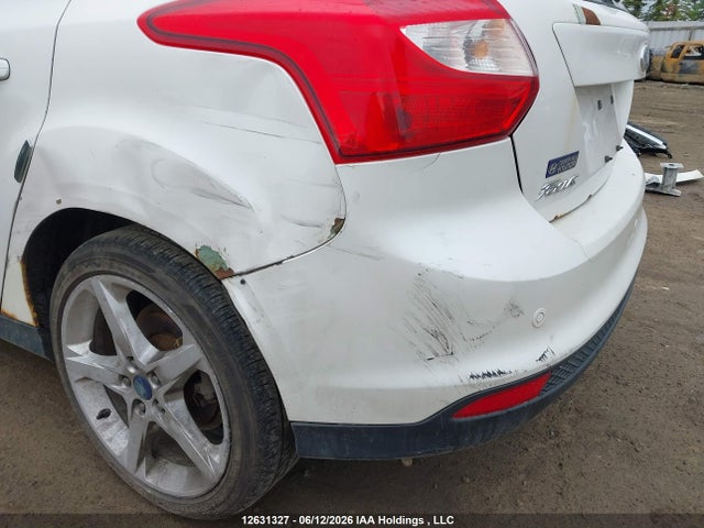 Продажа на аукционе авто 2012 Ford Focus Titanium, vin: 1FAHP3N27CL203387, номер лота: 12631327