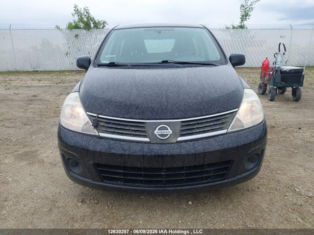 2009 Nissan Versa 1.8sl მანქანა იყიდება აუქციონზე, vin: 3N1BC13E59L450906, აუქციონის ნომერი: 12630257