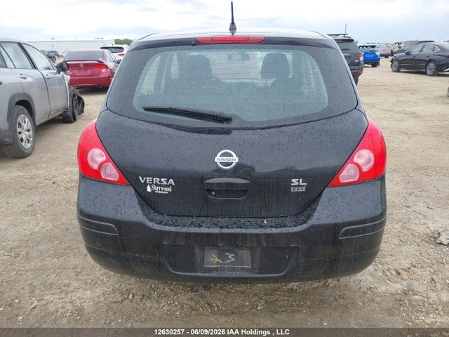 2009 Nissan Versa 1.8sl მანქანა იყიდება აუქციონზე, vin: 3N1BC13E59L450906, აუქციონის ნომერი: 12630257