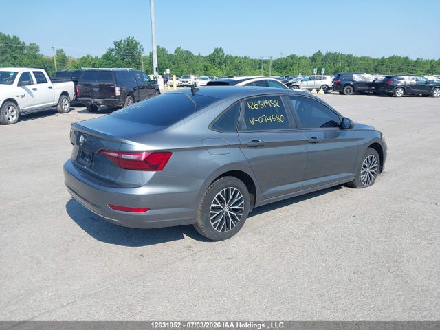 12631952 :رقم المزاد ، 3VWE57BU5MM074580 vin ، 2021 Volkswagen Jetta مزاد بيع