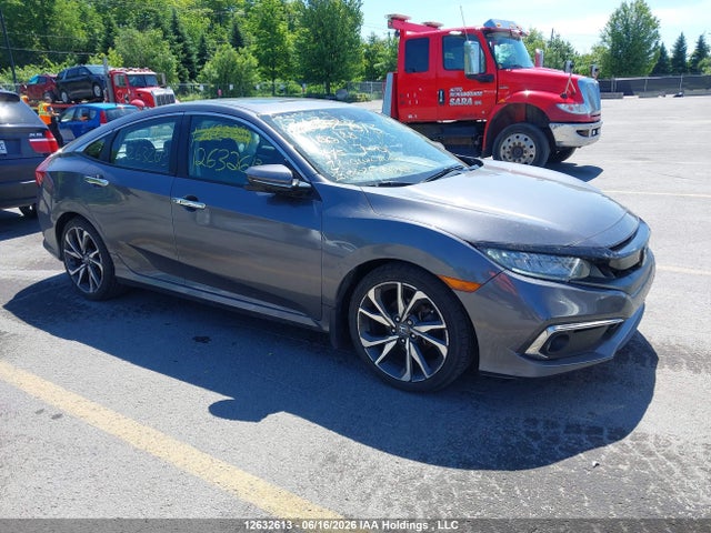 Продажа на аукционе авто 2021 Honda Civic Touring, vin: 2HGFC1F99MH100128, номер лота: 12632613