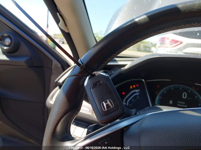 Продажа на аукционе авто 2021 Honda Civic Touring, vin: 2HGFC1F99MH100128, номер лота: 12632613