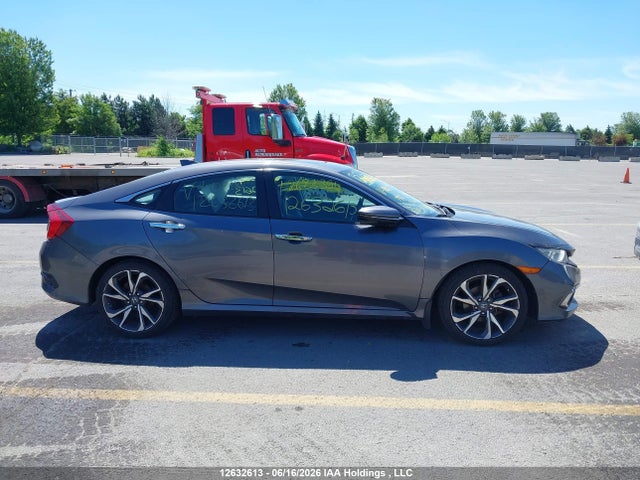 Продажа на аукционе авто 2021 Honda Civic Touring, vin: 2HGFC1F99MH100128, номер лота: 12632613