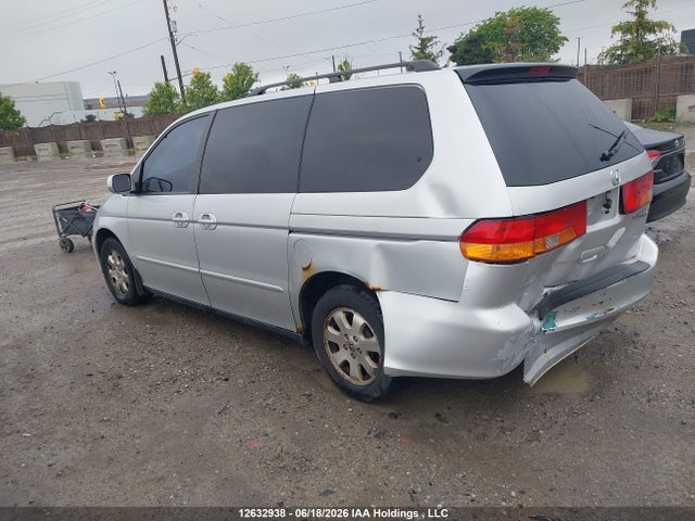 12632938 :رقم المزاد ، 2HKRL18634H006185 vin ، 2004 Honda Odyssey Ex مزاد بيع