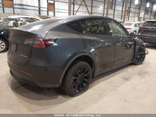 Tesla Model Y Long Range 2024 7SAYGDEE6RF209268 Image 4