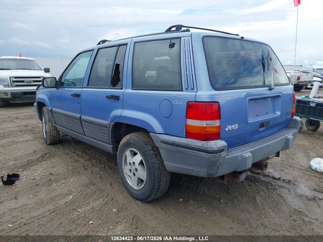 1993 Jeep Grand Cherokee Laredo მანქანა იყიდება აუქციონზე, vin: 1J4GZ58S9PC502600, აუქციონის ნომერი: 12634423