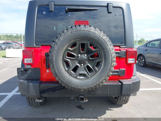 12635134 :رقم المزاد ، 1C4AJWAG9FL607702 vin ، 2015 Jeep Tj مزاد بيع