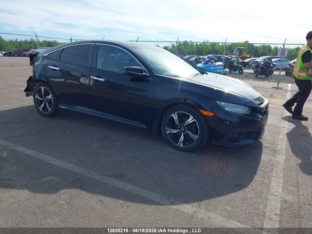 2016 Honda Civic Touring მანქანა იყიდება აუქციონზე, vin: 2HGFC1F95GH112331, აუქციონის ნომერი: 12635216