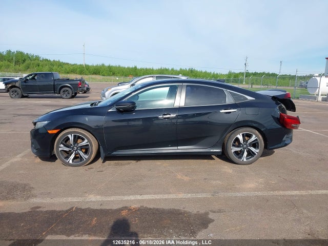 2016 Honda Civic Touring მანქანა იყიდება აუქციონზე, vin: 2HGFC1F95GH112331, აუქციონის ნომერი: 12635216