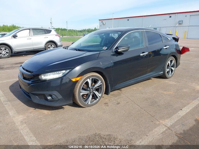 2016 Honda Civic Touring მანქანა იყიდება აუქციონზე, vin: 2HGFC1F95GH112331, აუქციონის ნომერი: 12635216