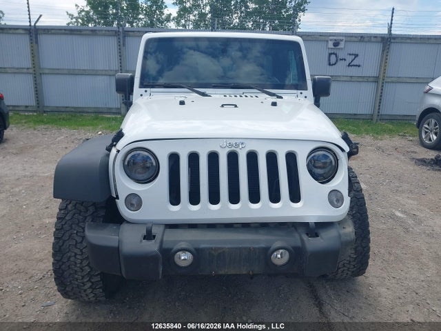 1C4BJWDG9FL721523 Jeep Wrangler Unlimited Sport