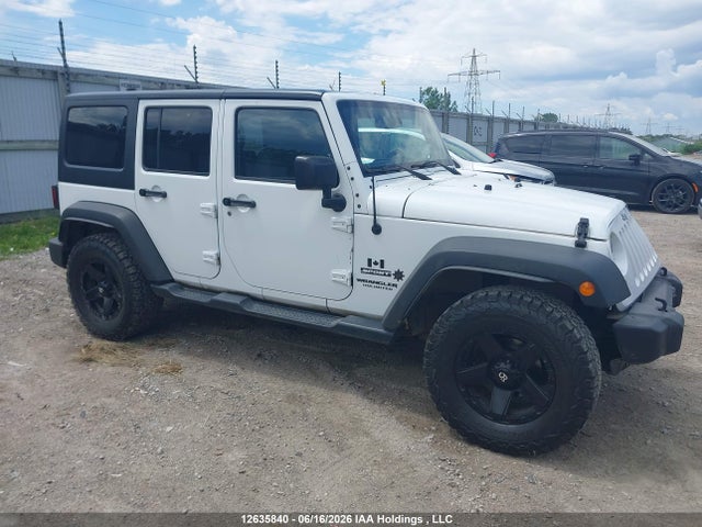 1C4BJWDG9FL721523 Jeep Wrangler Unlimited Sport