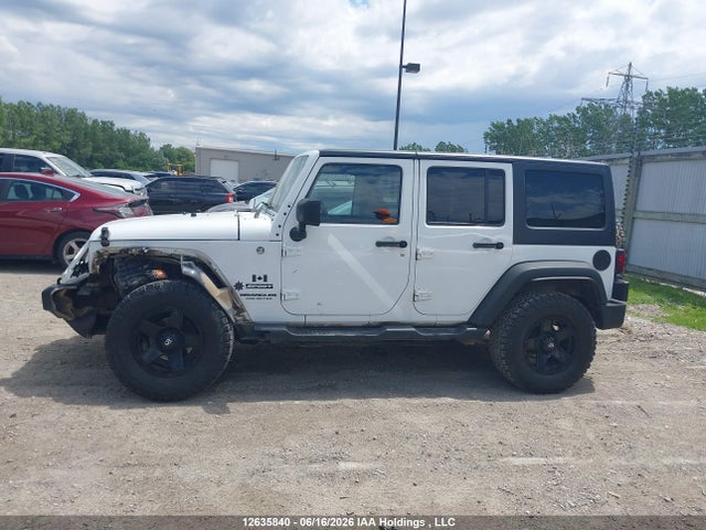 1C4BJWDG9FL721523 Jeep Wrangler Unlimited Sport