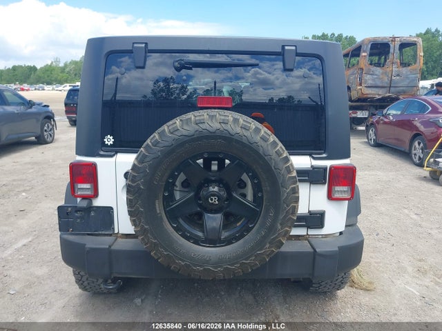 1C4BJWDG9FL721523 Jeep Wrangler Unlimited Sport