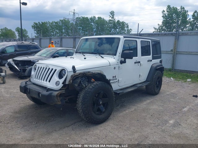 1C4BJWDG9FL721523 Jeep Wrangler Unlimited Sport