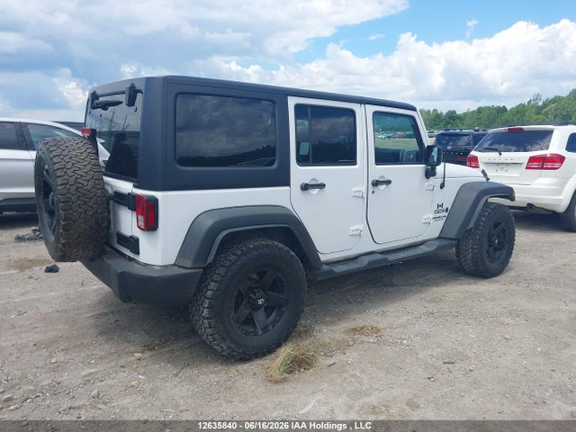 1C4BJWDG9FL721523 Jeep Wrangler Unlimited Sport