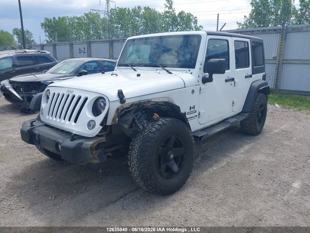 1C4BJWDG9FL721523 Jeep Wrangler Unlimited Sport