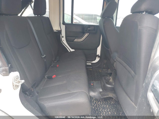 1C4BJWDG9FL721523 Jeep Wrangler Unlimited Sport