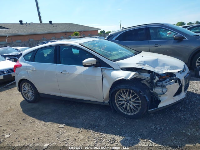 Продажа на аукционе авто 2014 Ford Focus Titanium, vin: 1FADP3N22EL394346, номер лота: 12636379