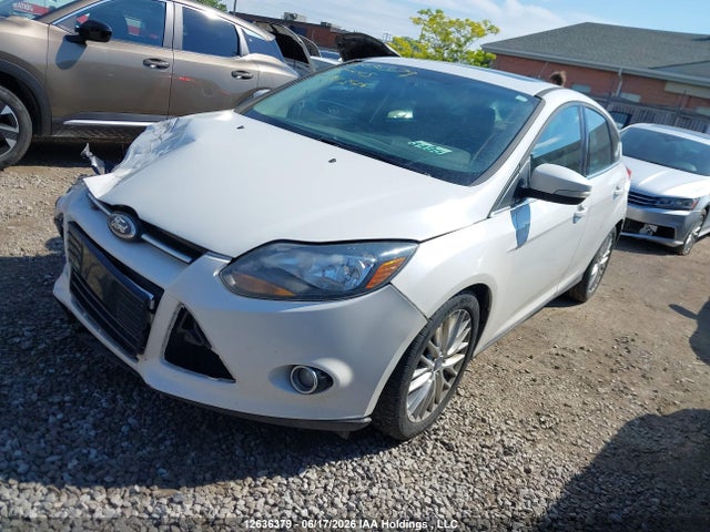 Продажа на аукционе авто 2014 Ford Focus Titanium, vin: 1FADP3N22EL394346, номер лота: 12636379
