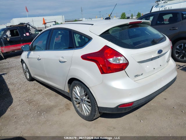 Продажа на аукционе авто 2014 Ford Focus Titanium, vin: 1FADP3N22EL394346, номер лота: 12636379