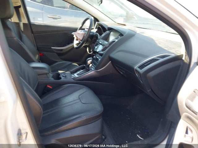 Продажа на аукционе авто 2014 Ford Focus Titanium, vin: 1FADP3N22EL394346, номер лота: 12636379