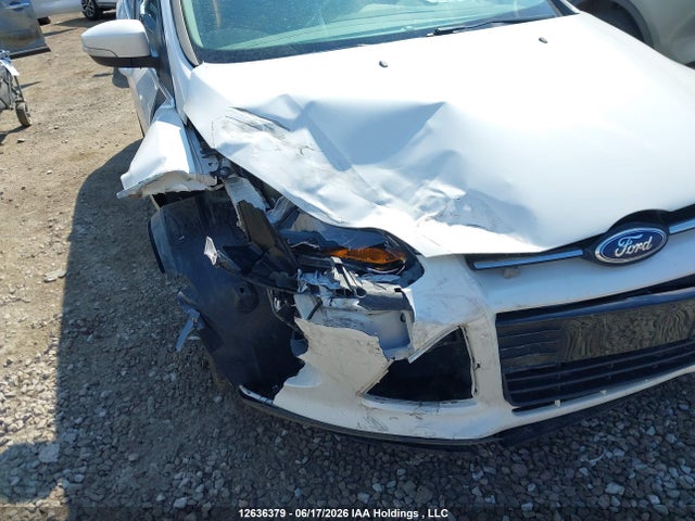 Продажа на аукционе авто 2014 Ford Focus Titanium, vin: 1FADP3N22EL394346, номер лота: 12636379