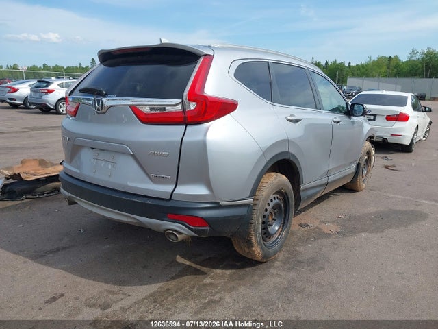 2019 Honda Cr-v Touring მანქანა იყიდება აუქციონზე, vin: 2HKRW2H97KH117973, აუქციონის ნომერი: 12636594