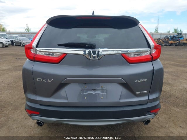 12637422 :رقم المزاد ، 2HKRW2H99KH103475 vin ، 2019 Honda Cr-v Touring مزاد بيع