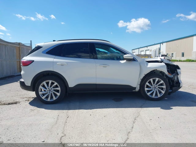12637667 :رقم المزاد ، 1FMCU9DZ6MUA61085 vin ، 2021 Ford Escape Titanium Hybrid مزاد بيع