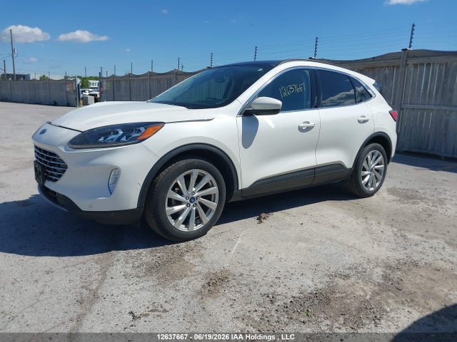 12637667 :رقم المزاد ، 1FMCU9DZ6MUA61085 vin ، 2021 Ford Escape Titanium Hybrid مزاد بيع