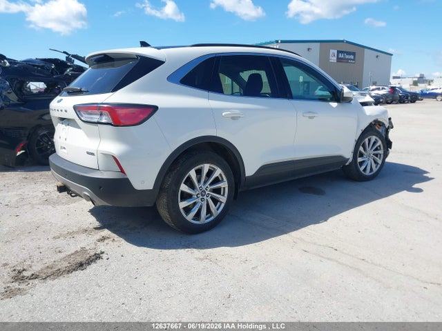 12637667 :رقم المزاد ، 1FMCU9DZ6MUA61085 vin ، 2021 Ford Escape Titanium Hybrid مزاد بيع
