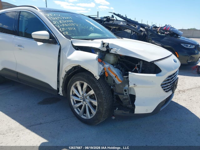 12637667 :رقم المزاد ، 1FMCU9DZ6MUA61085 vin ، 2021 Ford Escape Titanium Hybrid مزاد بيع