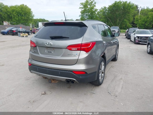 12638244 :رقم المزاد ، 5XYZUDLA0FG258416 vin ، 2015 Hyundai Santa Fe Sport 2.0t Limited مزاد بيع