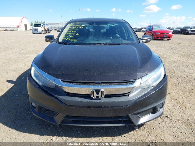 2016 Honda Civic Touring მანქანა იყიდება აუქციონზე, vin: 2HGFC1F95GH101166, აუქციონის ნომერი: 12638874