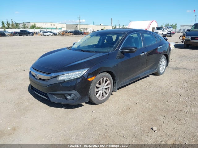2016 Honda Civic Touring მანქანა იყიდება აუქციონზე, vin: 2HGFC1F95GH101166, აუქციონის ნომერი: 12638874
