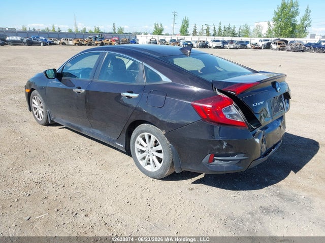 2016 Honda Civic Touring მანქანა იყიდება აუქციონზე, vin: 2HGFC1F95GH101166, აუქციონის ნომერი: 12638874