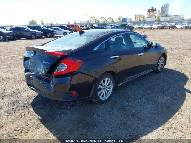 2016 Honda Civic Touring მანქანა იყიდება აუქციონზე, vin: 2HGFC1F95GH101166, აუქციონის ნომერი: 12638874