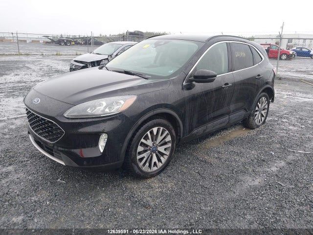 12639591 :رقم المزاد ، 1FMCU9DZ5LUA62971 vin ، 2020 Ford Escape Titanium Hybrid مزاد بيع