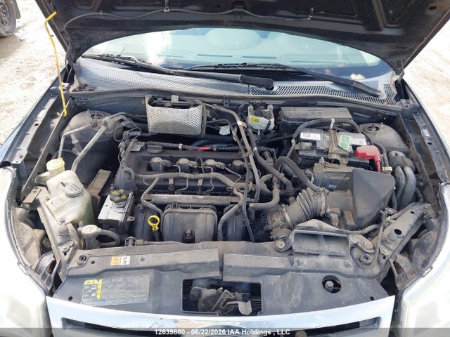 12639880 :رقم المزاد ، 1FAHP32N18W119571 vin ، 2008 Ford Focus S/se مزاد بيع