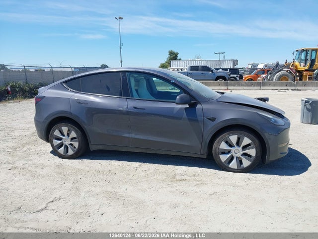 Tesla Model Y 2023 LRWYGDEE9PC103479 Image 12