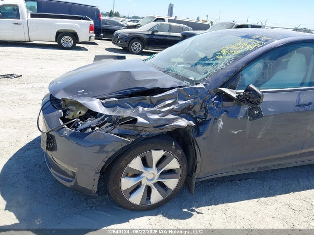 Tesla Model Y 2023 LRWYGDEE9PC103479 Image 6