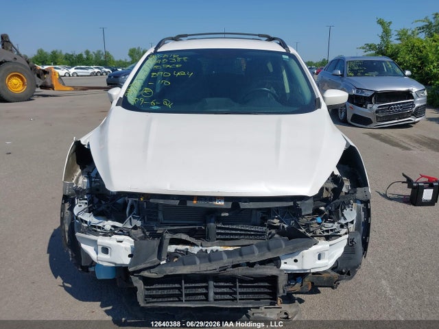 12640388 :رقم المزاد ، 1FMCU0HD3JUB90424 vin ، 2018 Ford Escape Sel مزاد بيع