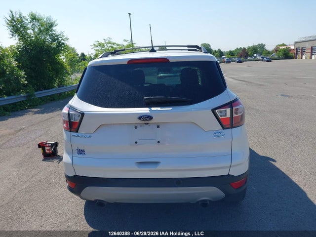 12640388 :رقم المزاد ، 1FMCU0HD3JUB90424 vin ، 2018 Ford Escape Sel مزاد بيع