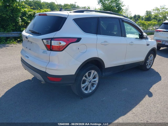 12640388 :رقم المزاد ، 1FMCU0HD3JUB90424 vin ، 2018 Ford Escape Sel مزاد بيع