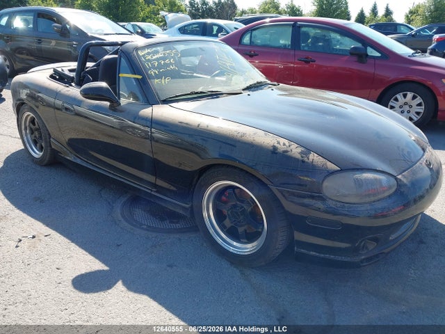 12640555 :رقم المزاد ، JM1NB3537X0117766 vin ، 1999 Mazda Miata مزاد بيع